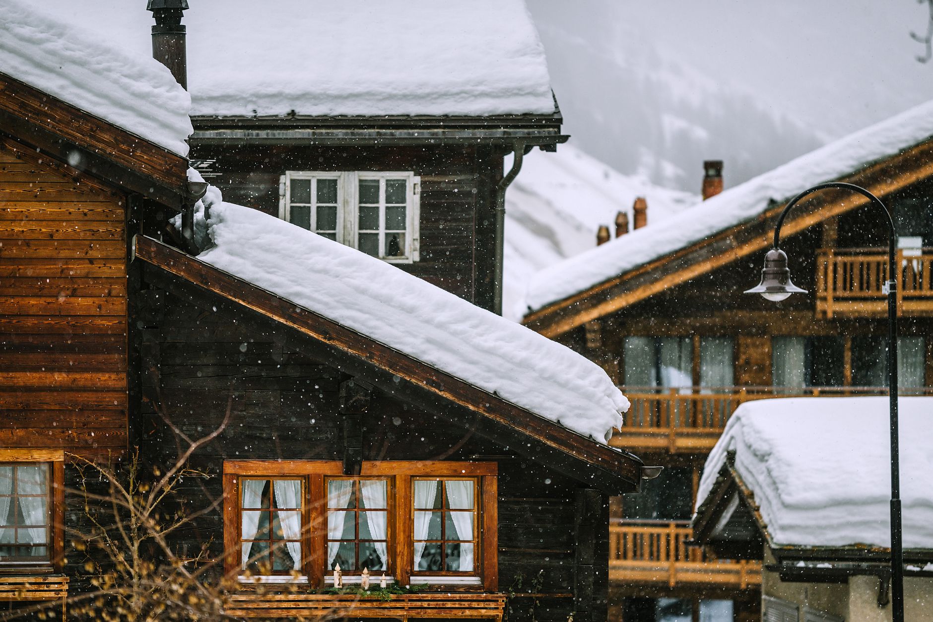 High alpine valley with wooden chalet architecture